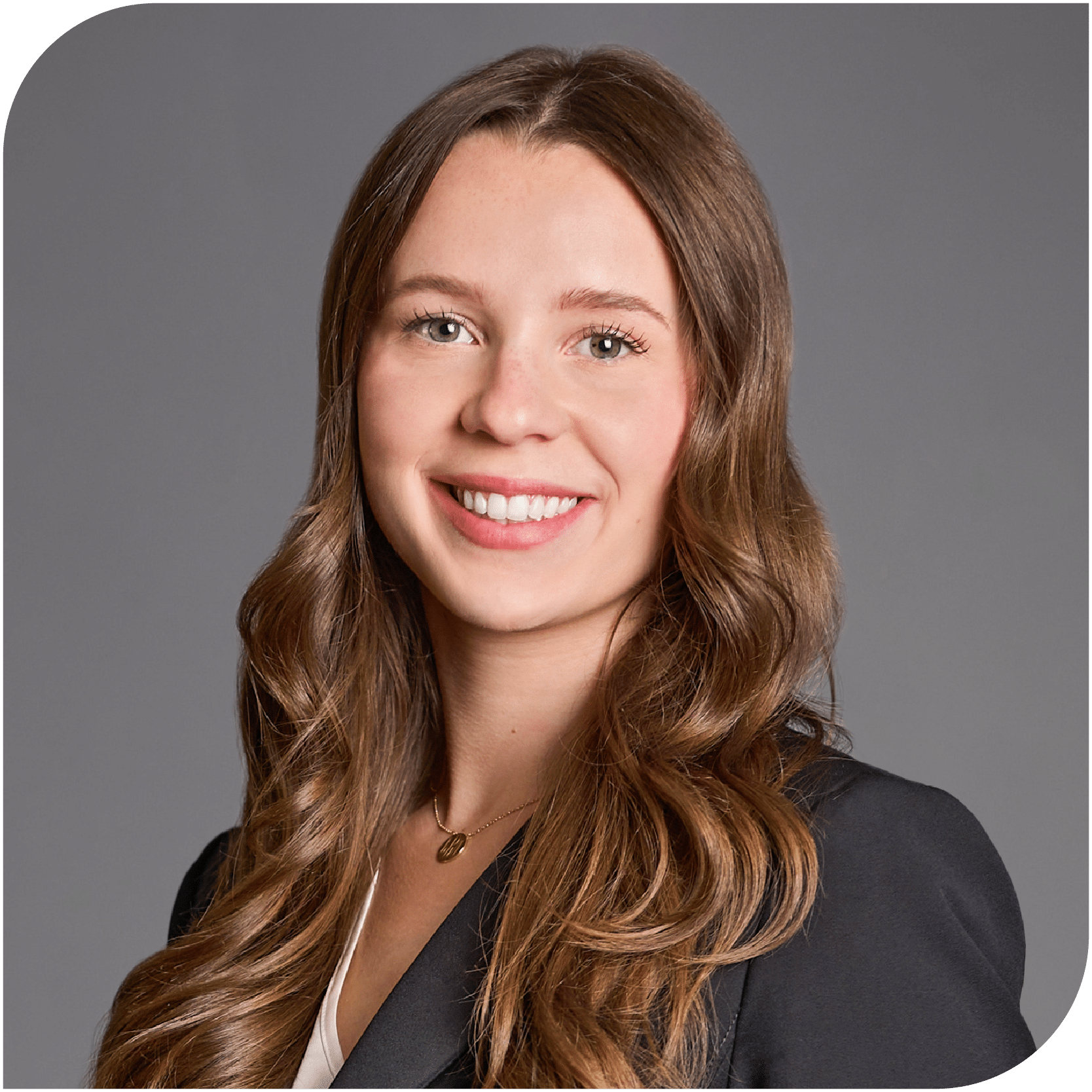 Lindsay Rudd, Fraser Stryker Summer Associate, wearing a black suit jacket and white shirt.