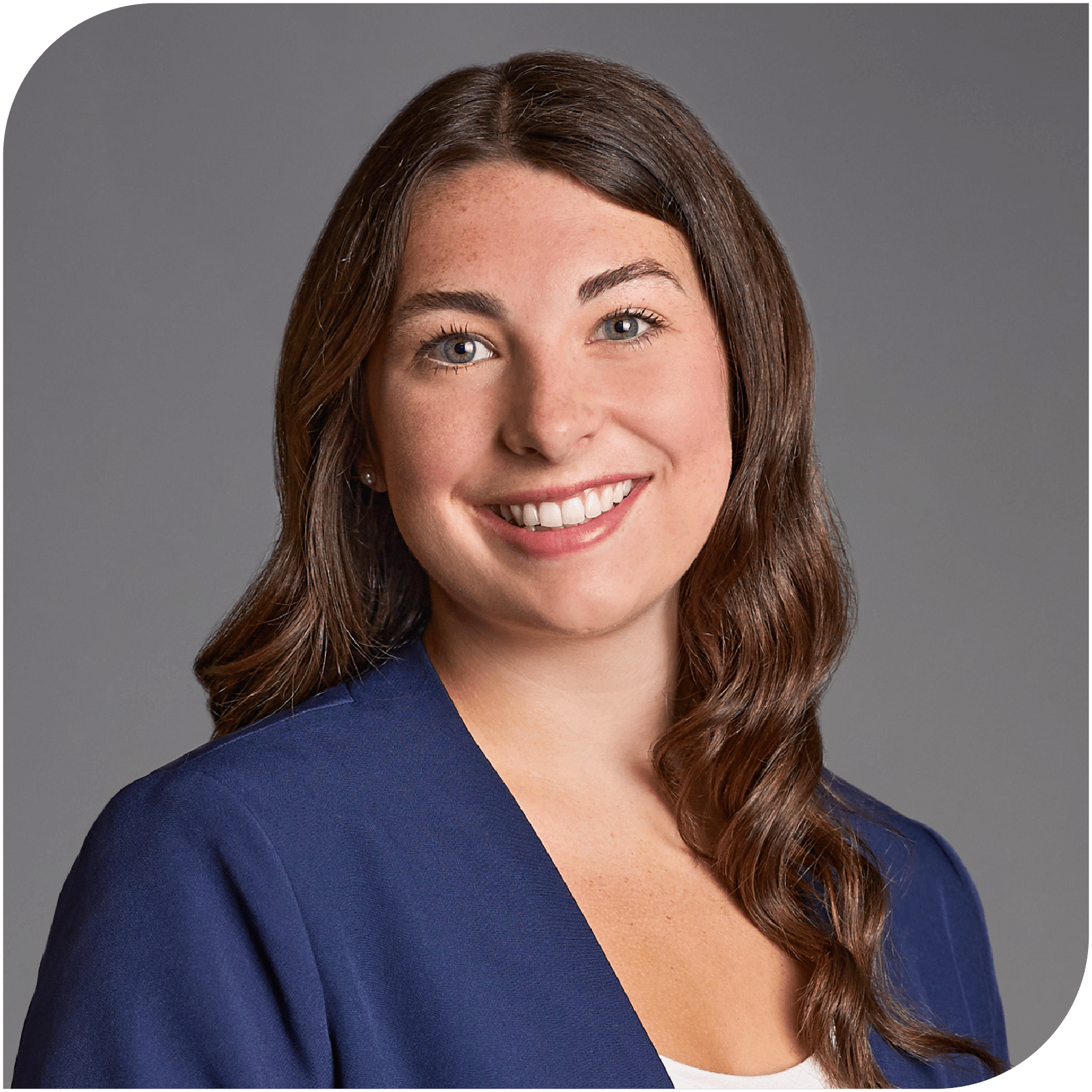 Soffi Olson, Fraser Stryker Summer Associate, wearing a blue suit jacket and white shirt.